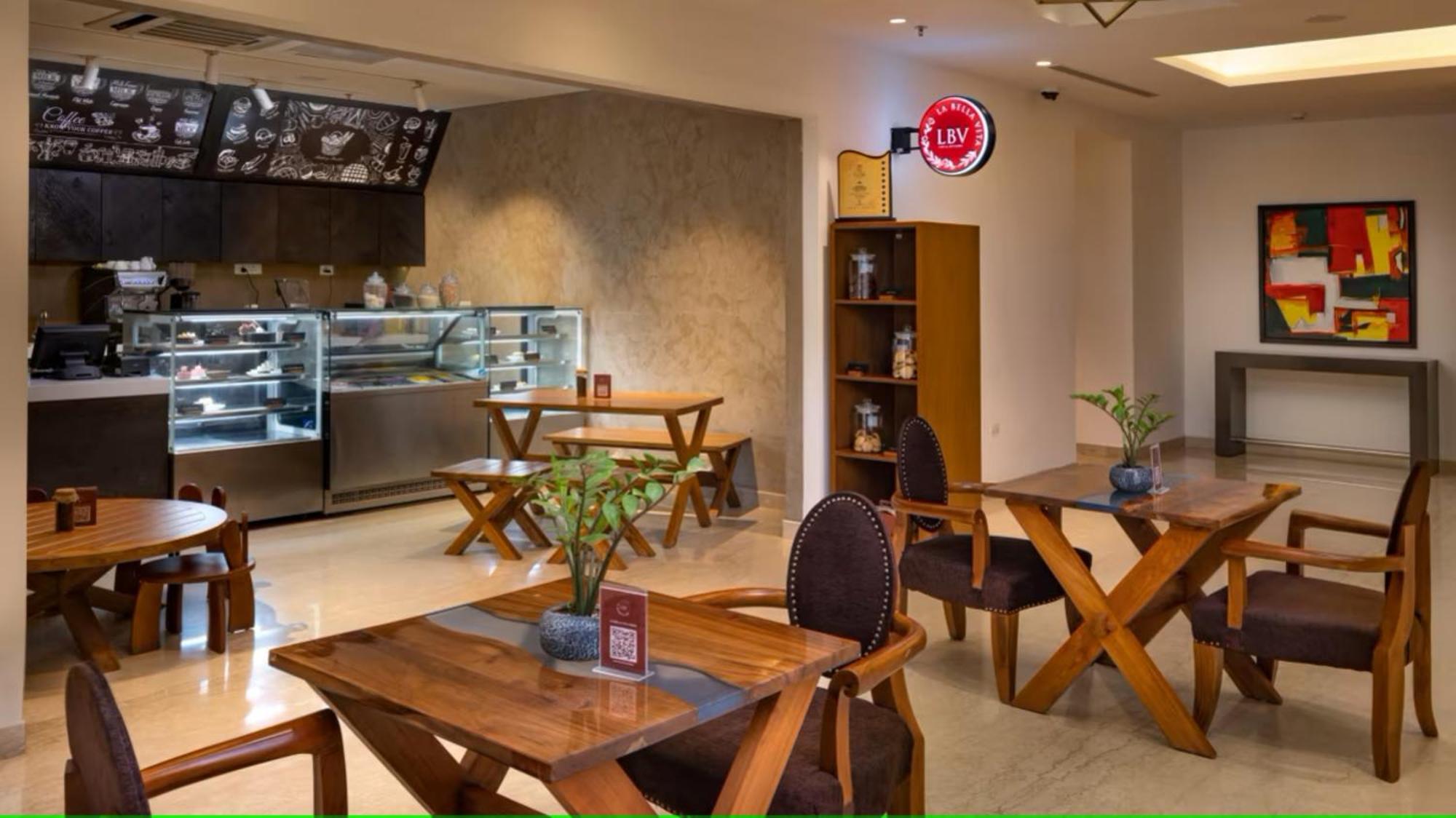 O By Tamara, Trivandrum Thiruvananthapuram Bagian luar foto The Cafe